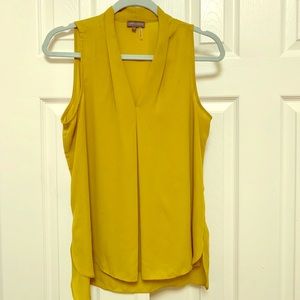Yellow sleeveless blouse